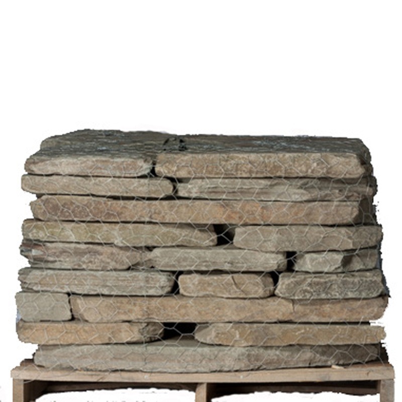 tumbled colonial bluestone on a pallet on a white background
